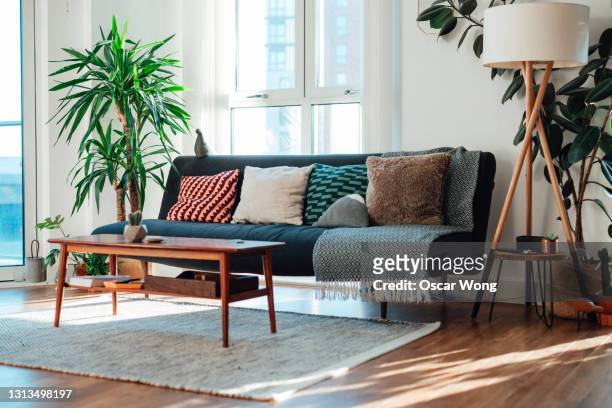 minimal style living room with sunlight coming through the window - living room stock pictures, royalty-free photos & images