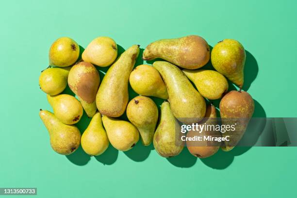 a rectangle made of crowded conference pears - birne stock-fotos und bilder