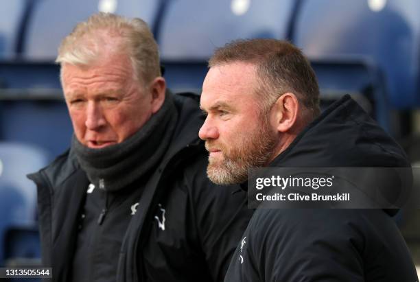 Wayne Rooney, Manager of Derby County talks to Technical Director Steve McClaren prior to the Sky Bet Championship match between Preston North End...