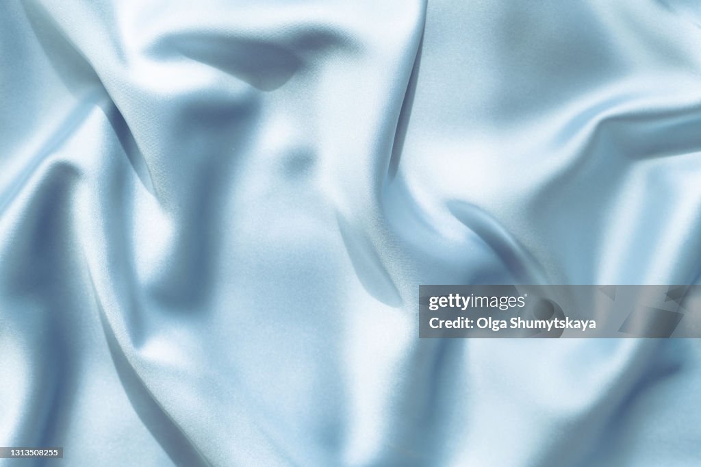 Background of blue silk folds