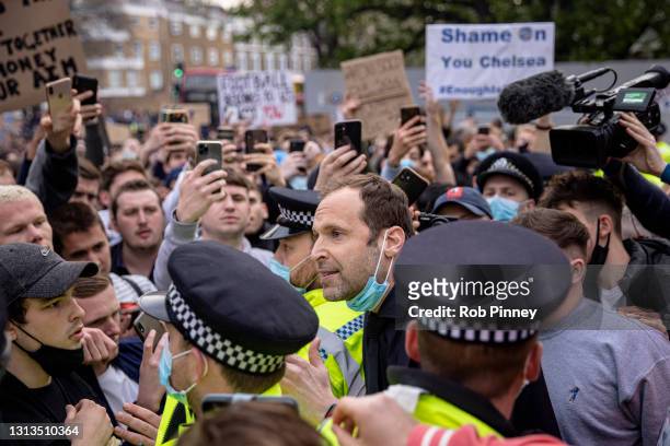Chelsea Technical Advisor Petr Čech speaks to fans of Chelsea Football Club protesting outside the team's Stamford Bridge ground on April 20, 2021 in...