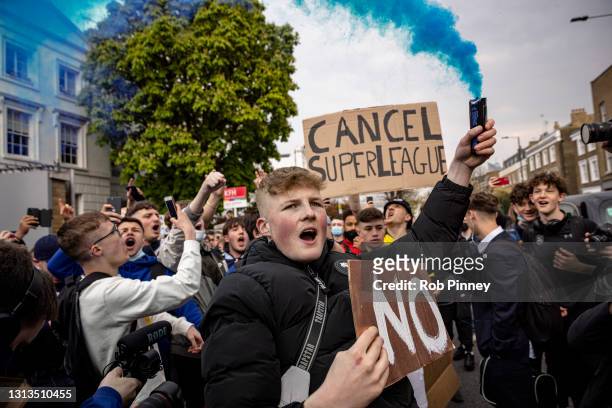 Fans of Chelsea Football Club protest against the European Super League outside Stamford Bridge on April 20, 2021 in London, England. Six English...