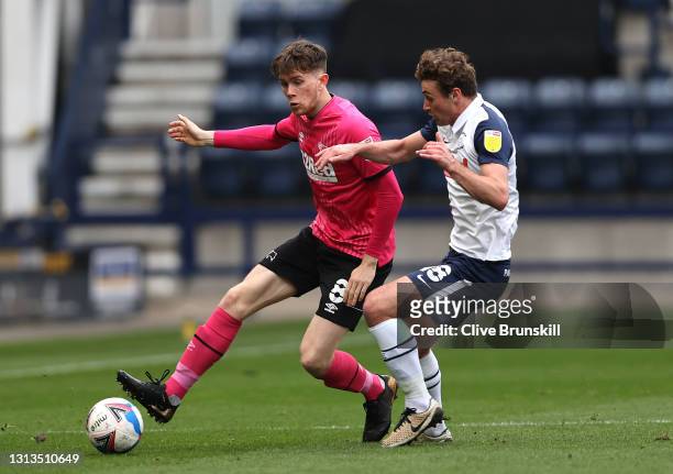 Max Bird of Derby County and Ryan Ledson of Preston North End battle for the ball during the Sky Bet Championship match between Preston North End and...