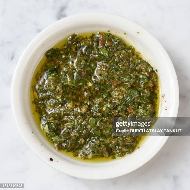 parsley chimichurri sauce - chimichurri stockfoto's en -beelden