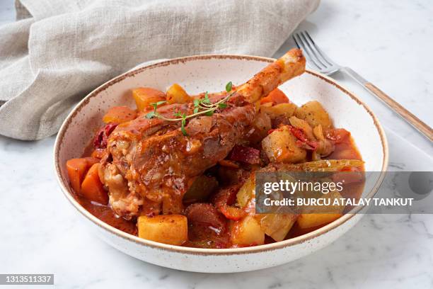 slow cooked lambs shank - lamb shank stock pictures, royalty-free photos & images