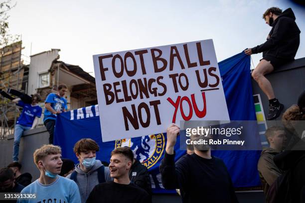 Chelsea Football Club fans celebrate outside the team's Stamford Bridge stadium on April 20, 2021 in London, England, after it was announced that...
