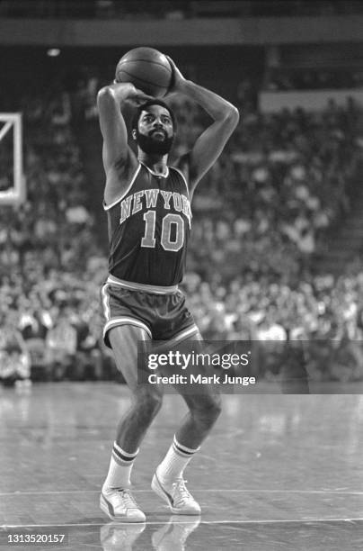 New York Knicks guard Walt Frazier shoots a free throw during an NBA basketball game against the Denver Nuggets at McNichols Arena on November 3,...