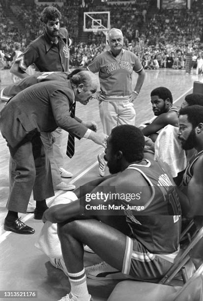 New York Knicks coach Red Holzman exhorts his team during a timeout in a game against the Denver Nuggets at McNichols Arena on November 3, 1976 in...