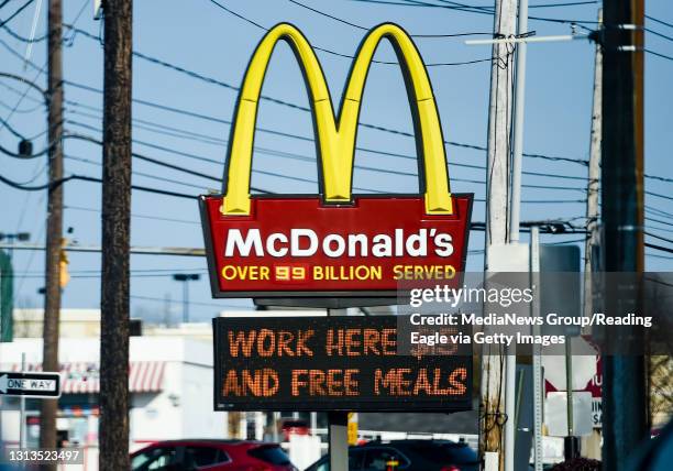 Sinking Spring, PA The sign at the McDonald's restaurant on Penn Ave in Sinking Spring, PA April 8, 2021 with a message on a board below it that...