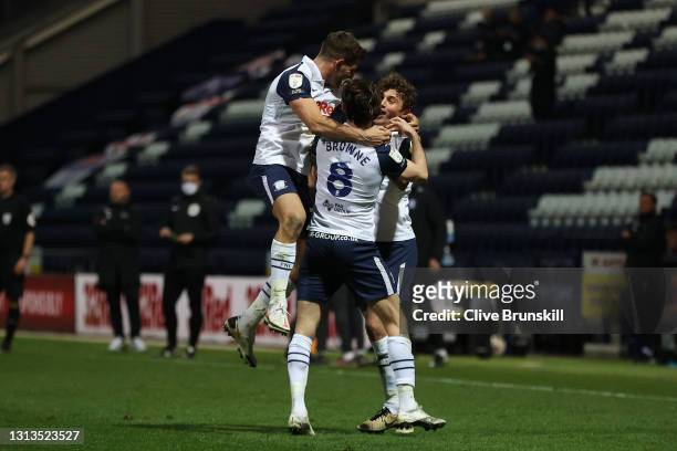 Ryan Ledson of Preston North End celebrates with teammates after scoring their team's third goal during the Sky Bet Championship match between...