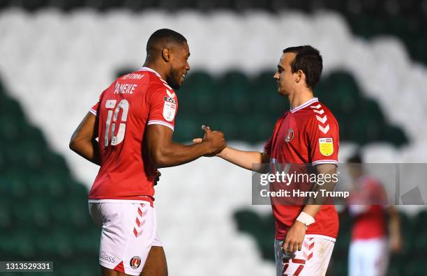 Chuks Aneke of Charlton Athletic celebrates after scoring their sides sixth goal with team mate Liam Miller during the Sky Bet League One match...