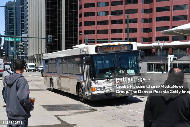 The RTD 0 Line bus arrives at the bus stop of Broadway and Colfax Ave. In Denver, Colorado on Tuesday, April 20, 2021.