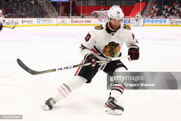 Brett Connolly of the Chicago Blackhawks skates against the Detroit Red Wings at Little Caesars Arena on April 15, 2021 in Detroit, Michigan.