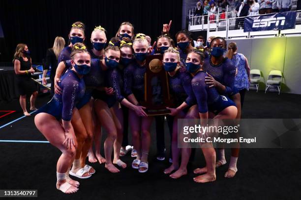 The Michigan Wolverines react to winning the Division I Women’s Gymnastics Championship held at Dickies Arena on April 17, 2021 in Fort Worth, Texas.