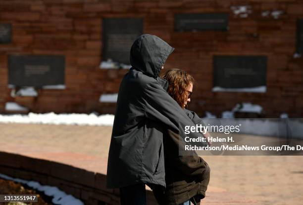 Lisa Rohrbough, the stepmother of Columbine victim Daniel "u201cDanny"u201d Rohrbough, is hugged by her son Issac Rohrbough as they spend time at the...