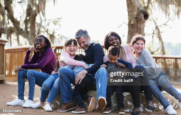 blended family with five children outdoors at a park - family with five children stock pictures, royalty-free photos & images