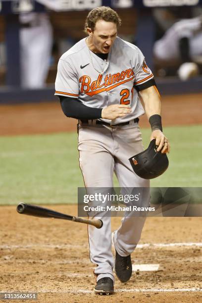 Austin Hays of the Baltimore Orioles reacts after striking out during the eighth inning of the MLB game against the Miami Marlins at loanDepot park...