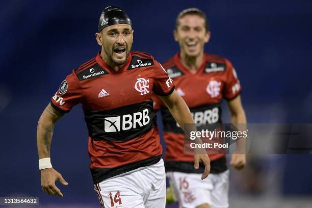 Giorgian de Arrascaeta of Flamengo celebrates after scoring the third goal of his team during a match between Velez Sarsfield and Flamengo as part of...