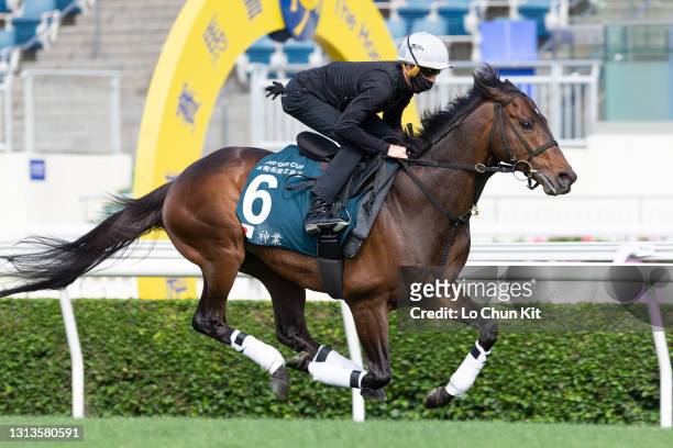 Jockey Chad Schofield riding Japanese runner Kiseki exercises at Sha Tin Racecourse on April 21, 2020 in Hong Kong.