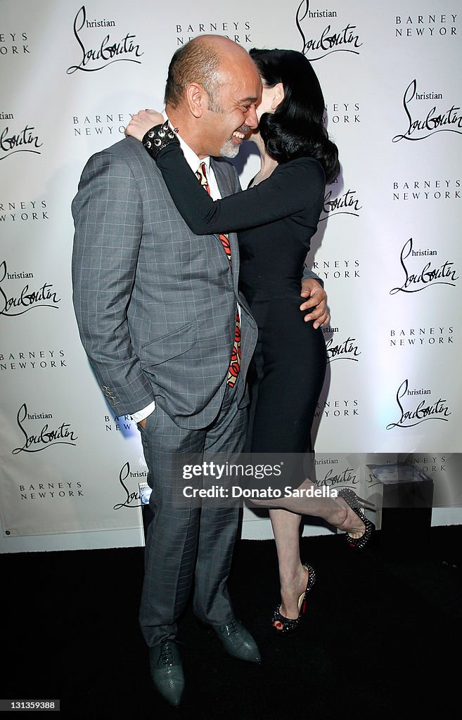 Shoe designer Christian Louboutin and Dita Von Teese attend the