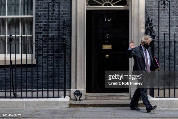 Prime minister Boris Johnson leaves 10 Downing Street to head to Parliament for Prime Minister's Questions, on April 21, 2021 in London, England.