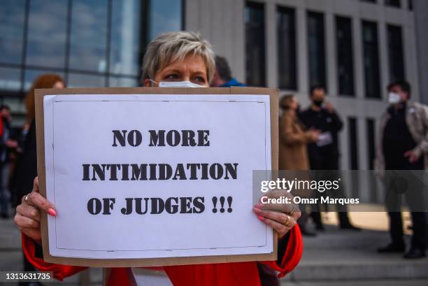 Supporters and Judges of Krakow Courts hold banners during a protest against an ongoing session in the illegal Disciplinary Chamber of Poland's...