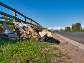 Trade waste dumped illegally (fly tipped) at the roadside on a country lane in winter. Taken in the north west of the UK.