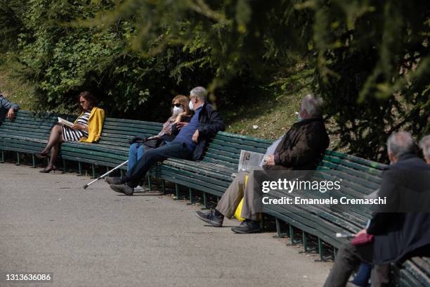 Elderly people sit on the world's longest bench on April 21, 2021 in Milan, Italy. Located at Parco Industria Alfa Romeo , the 208 meters long...
