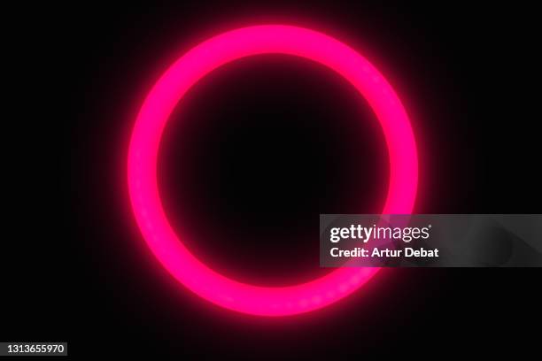 red circle neon light glowing at night wit black background. - neon circle stock pictures, royalty-free photos & images