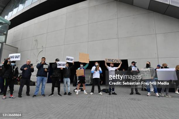 Tottenham Hotspur fans protest against chairman of the club, Daniel Levy and the European Super League prior to the Premier League match between...
