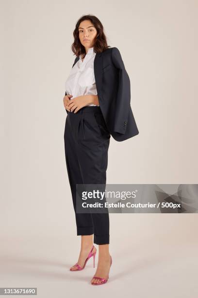 portrait of fashionable and stylish young business woman in studio,avignon,france - abbigliamento formale foto e immagini stock