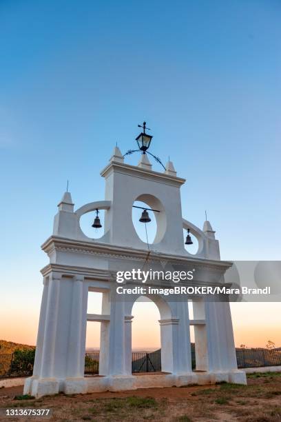 bell tower of the chapel ermita reina de los angeles, at sunset, alajar, huelva, spain - provincia de huelva stock pictures, royalty-free photos & images