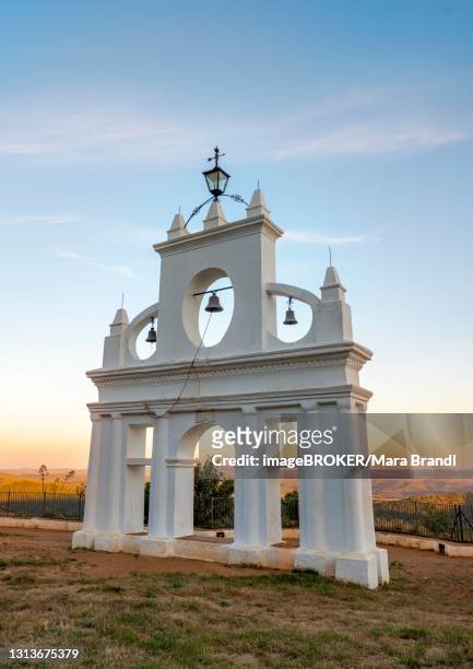 bell tower of the chapel ermita reina de los angeles, at sunset, alajar, huelva, spain - provincia de huelva stock pictures, royalty-free photos & images
