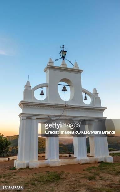 bell tower of the chapel ermita reina de los angeles, at sunset, alajar, huelva, spain - provincia de huelva stock pictures, royalty-free photos & images