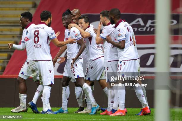 Edgar Ie of Trabzonspor celebrates scoring a goal with teammates during the Super Lig match between Galatasaray and Trabzonspor at Turk Telekom...