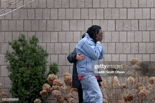 Mourners leave the visitation of Daunte Wright at Shiloh Temple International Ministries on April 21, 2021 in Minneapolis, Minnesota. Twenty-year-old...