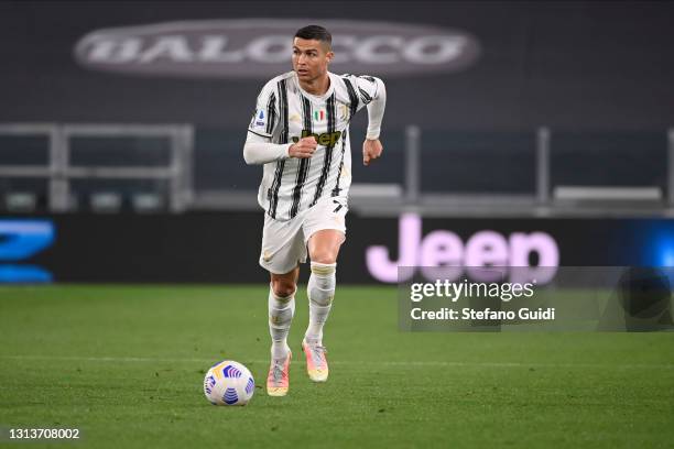 Cristiano Ronaldo of Juventus FC controls the ball during the Serie A match between Juventus and Parma Calcio at on April 21, 2021 in Turin, Italy.