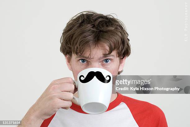 man drinking coffee - schnauzbart kaiserlich stock-fotos und bilder