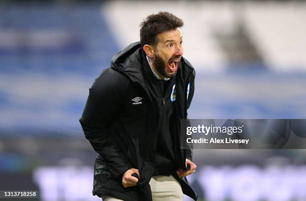 Carlos Corberan the manager of Huddersfield Town reacts during the Sky Bet Championship match between Huddersfield Town and Barnsley at John Smith's...