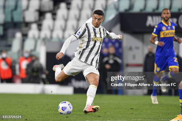 Cristiano Ronaldo of Juventus kicks the ball during the Serie A match between Juventus and Parma Calcio at Allianz Stadium on April 21, 2021 in...