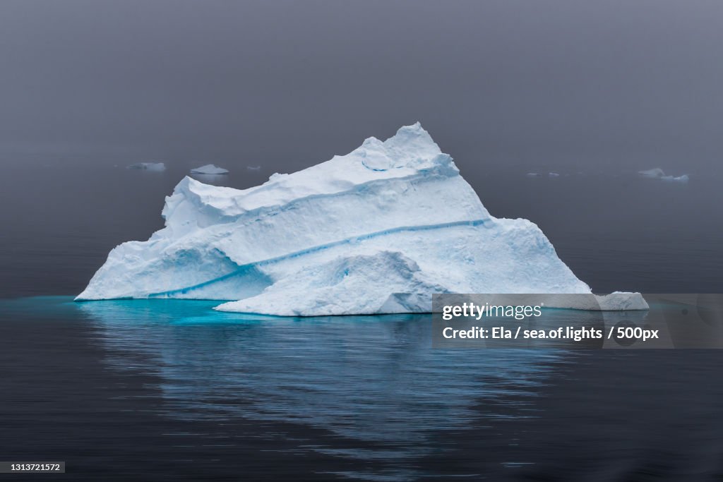 Scenic view of sea against sky during winter