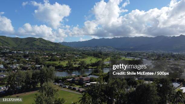 panoramic view of townscape and mountains against sky,kailua,hawaii,united states,usa - kailua stockfoto's en -beelden