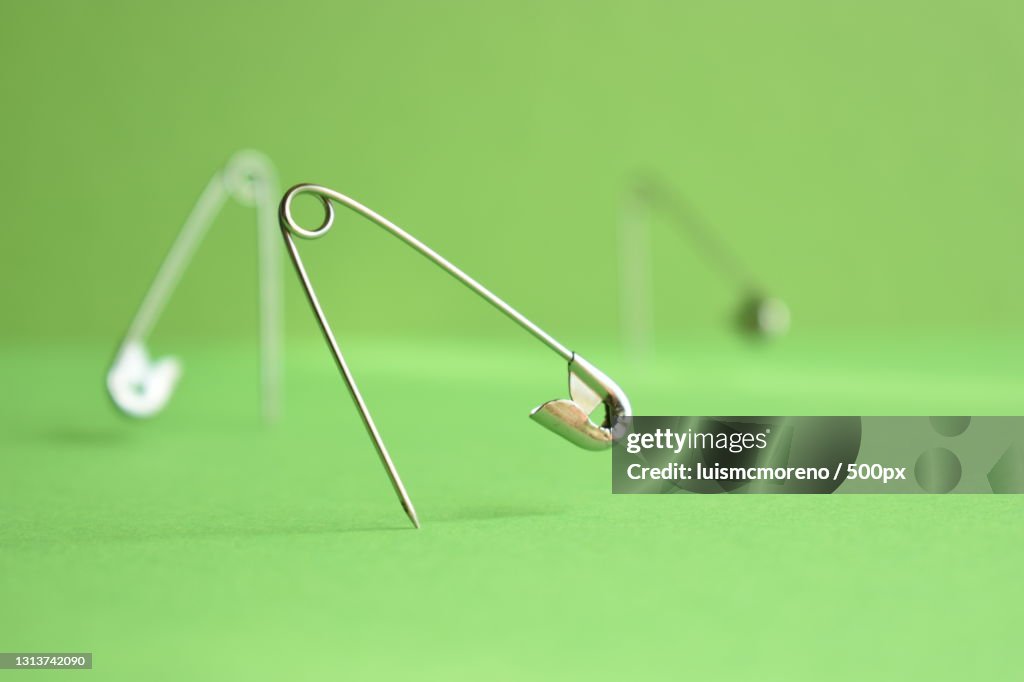 Close-up of green fidget spinner on table