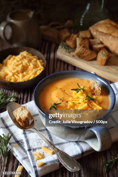 high angle view of soup in bowl on table - velouté sauce stock pictures, royalty-free photos & images