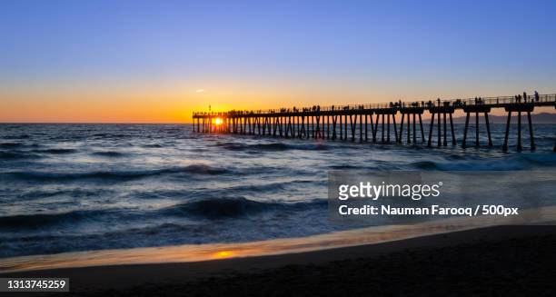 scenic view of sea against clear sky during sunset,hermosa beach,california,united states,usa - hermosa beach stock pictures, royalty-free photos & images