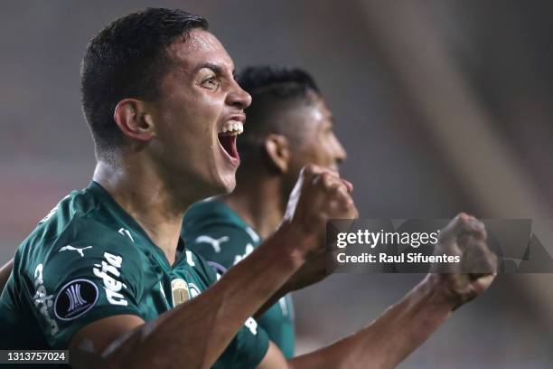 Renan of Palmeiras celebrates after scoring the third goal of his team during a match between Universitario and Palmeiras as part of Group A of Copa...