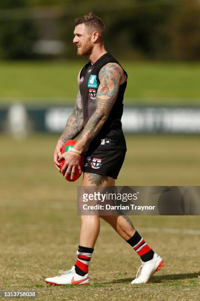 Tim Membrey kicks the ball during a St Kilda Saints AFL training session at RSEA Park on April 22, 2021 in Melbourne, Australia.