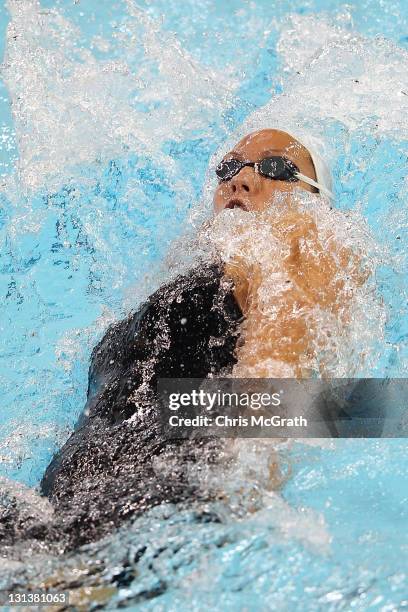 Alexianne Castel of France competes in the Women's 200m Backstroke final during day one of the 2011 FINA World Cup at Singapore Sports School on...