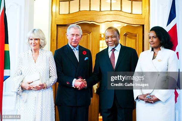 Prince Charles, Prince of Wales and his wife Camilla, Duchess of Cornwall at Oliver Tambo House on November 3, 2011 in Pretoria, South Africa where...