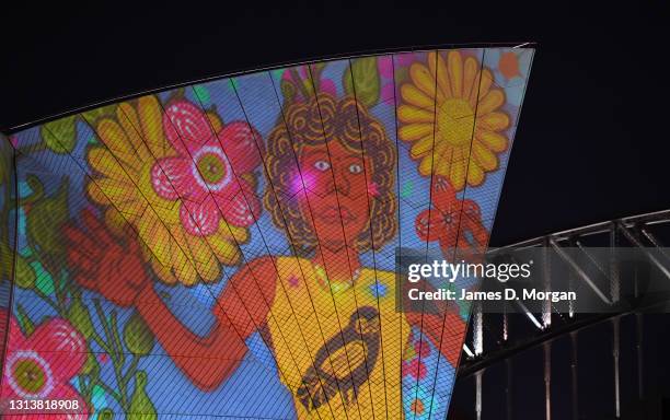 Projections of First Nations art illuminate the Opera House's eastern Bennelong sails at the Sydney Opera House on April 22, 2021 in Sydney,...